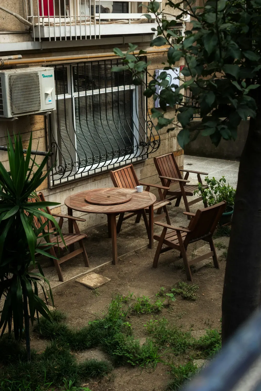 Backyard patio seating area with clean surfaces and refreshed outdoor entertaining space.